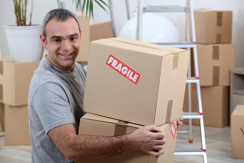 Moving home service in Mile End with boxes and furniture ready for loading