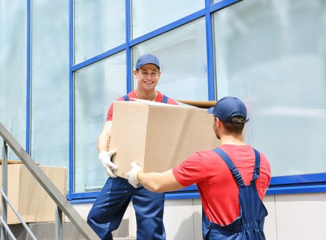 Packing and loading belongings into a removals van
