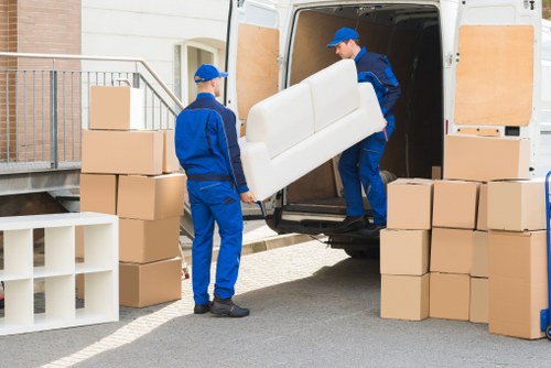 Person using an accessible moving service website on a laptop