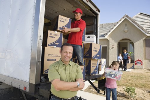 Careful loading of household items for a Mile End move
