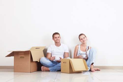 Checklist and moving boxes prepared for a home move in Mile End