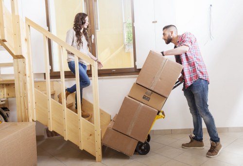 Moving van hire navigating residential streets and parking in Mile End